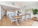 Bright dining room with a rustic wooden table and ocean view at 1394/96 Pelican Watch Villas, Seabrook Island, SC 29455