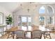 Ocean view dining room, features a large wooden table and chairs at 1394/96 Pelican Watch Villas, Seabrook Island, SC 29455