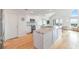 Open concept kitchen with granite island and hardwood floors at 1394/96 Pelican Watch Villas, Seabrook Island, SC 29455