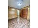 Bright bedroom featuring wood-look floors and ample space at 313 Pine Needle Rd, Walterboro, SC 29488