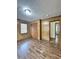 Bedroom with wood-look floors and two closets at 313 Pine Needle Rd, Walterboro, SC 29488