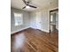 Bright bedroom with hardwood floors, large window, and spacious closet at 201 Josie Dr, Walterboro, SC 29488