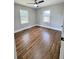 Spacious bedroom with hardwood floors and ceiling fan at 201 Josie Dr, Walterboro, SC 29488