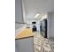 Updated kitchen boasts stainless steel appliances and a butcher block countertop at 201 Josie Dr, Walterboro, SC 29488