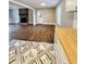 Remodeled kitchen features butcher block countertops, stainless steel appliances, and geometric tile floors at 201 Josie Dr, Walterboro, SC 29488
