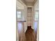 Neatly organized hall closet with wooden shelves at 201 Josie Dr, Walterboro, SC 29488