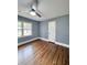 Spacious bedroom with hardwood floors and ceiling fan at 201 Josie Dr, Walterboro, SC 29488