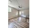 Bright living room with hardwood floors, neutral walls, and access to the exterior at 201 Josie Dr, Walterboro, SC 29488