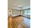 Hardwood floors and neutral walls in this bright and airy living room at 201 Josie Dr, Walterboro, SC 29488