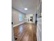 Spacious dining area with hardwood floors and an open view of the kitchen at 201 Josie Dr, Walterboro, SC 29488