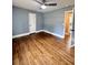 Bright bedroom featuring hardwood floors and ceiling fan at 201 Josie Dr, Walterboro, SC 29488