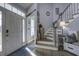 Inviting entryway with hardwood floors and a staircase leading upstairs at 1241 Blue Sky Ln, Charleston, SC 29492