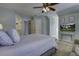Charming bedroom with a queen-size bed and a view of the backyard at 1241 Blue Sky Ln, Charleston, SC 29492