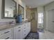 Elegant bathroom with double sinks, a large shower, and a relaxing atmosphere at 1241 Blue Sky Ln, Charleston, SC 29492