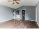 Main bedroom features a ceiling fan and en-suite bathroom access at 215 Cantilever Ct, Summerville, SC 29486