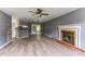 Living room with fireplace, hardwood floors, and open concept at 215 Cantilever Ct, Summerville, SC 29486