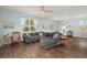 Relaxing living room featuring a gray sectional sofa and hardwood floors at 141 Lagoona Dr, Summerville, SC 29483