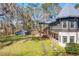 A two-story home with a deck, and storage shed in the background at 2773 Mt Carmel Rd, Walterboro, SC 29488