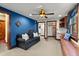 Cozy bonus room features a comfy couch, built-in shelves, and a tranquil atmosphere at 2773 Mt Carmel Rd, Walterboro, SC 29488