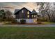 Unique home showcases a rustic exterior and charming landscaping at 2773 Mt Carmel Rd, Walterboro, SC 29488