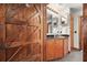 Elegant bathroom boasts a rustic barn door and a double vanity with granite countertops at 2773 Mt Carmel Rd, Walterboro, SC 29488