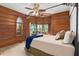 Main bedroom with four-poster bed and bay window at 2773 Mt Carmel Rd, Walterboro, SC 29488