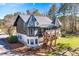 Exterior view of a charming two-story home with unique architectural details at 2773 Mt Carmel Rd, Walterboro, SC 29488