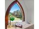 Desk with view of the property from an arched window at 2773 Mt Carmel Rd, Walterboro, SC 29488