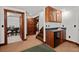 Finished basement with a kitchenette and stairs at 2773 Mt Carmel Rd, Walterboro, SC 29488