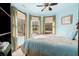Bright bedroom with light blue walls and bay windows at 2773 Mt Carmel Rd, Walterboro, SC 29488