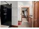 Modern bathroom includes a black shower, tiled floors and a view into another room at 2773 Mt Carmel Rd, Walterboro, SC 29488