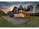 Multi-level home showcasing a spacious deck and surrounding greenery at 2773 Mt Carmel Rd, Walterboro, SC 29488