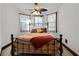 Cozy bedroom with bay windows and ceiling fan at 2773 Mt Carmel Rd, Walterboro, SC 29488