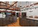 Dark wood cabinetry, granite countertops, and an island define this rustic kitchen at 2773 Mt Carmel Rd, Walterboro, SC 29488