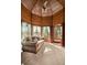 Relaxing sunroom features wood walls, a ceiling fan, and ample natural light at 2773 Mt Carmel Rd, Walterboro, SC 29488
