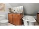 Small bathroom with a vintage clawfoot tub and modern vanity at 2773 Mt Carmel Rd, Walterboro, SC 29488