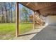 Covered patio with wooden stairs and ceiling fan at 2773 Mt Carmel Rd, Walterboro, SC 29488