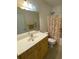 Bathroom with updated vanity and shower/tub combo at 422 Constance St, Walterboro, SC 29488