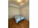 Bright bedroom with wood floors and double doors at 422 Constance St, Walterboro, SC 29488