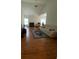 Spacious living room with hardwood floors and a fireplace at 422 Constance St, Walterboro, SC 29488