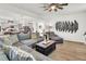 Open living room with sectional sofa and kitchen view at 120 Haverhill St, Summerville, SC 29486