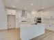 Modern kitchen with white cabinets, quartz countertops, and island at 2193 Blue Bayou Blvd, Johns Island, SC 29455