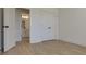 Spacious bedroom with double doors leading to the bathroom and hardwood floors at 2193 Blue Bayou Blvd, Johns Island, SC 29455