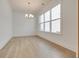 Bright dining room featuring hardwood floors and a chandelier at 2193 Blue Bayou Blvd, Johns Island, SC 29455