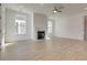 Spacious living room featuring hardwood floors and fireplace at 2193 Blue Bayou Blvd, Johns Island, SC 29455