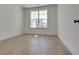 Bright bedroom with hardwood floors and large window at 2193 Blue Bayou Blvd, Johns Island, SC 29455