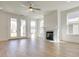 Bright living room with fireplace and hardwood floors at 2193 Blue Bayou Blvd, Johns Island, SC 29455