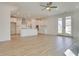 Open concept kitchen with white cabinets and island at 2193 Blue Bayou Blvd, Johns Island, SC 29455