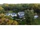 Aerial view of house, guest house, and expansive property at 6949 Maybank Hwy, Wadmalaw Island, SC 29487