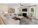 Living room with hardwood floors, fireplace, and comfortable seating at 120 Palfrey Dr, Ridgeville, SC 29472